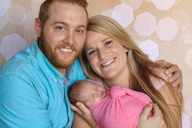family with newborn girl